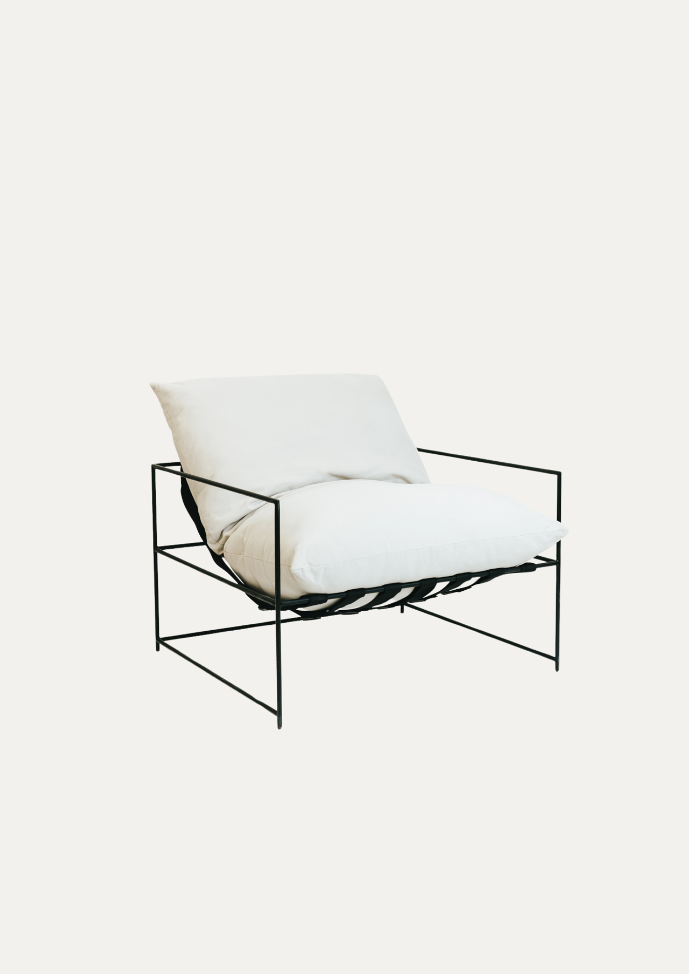 black frame off white armchair.png